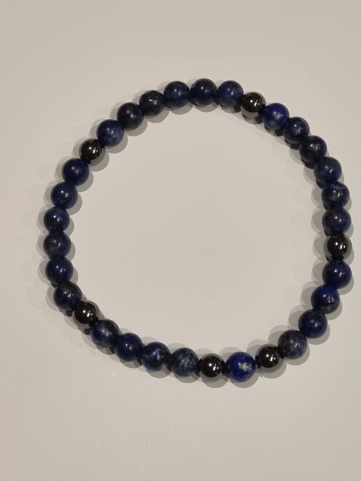 Bracelet homme 6mm perles naturelles lapi lazuli et hématite. Élastique