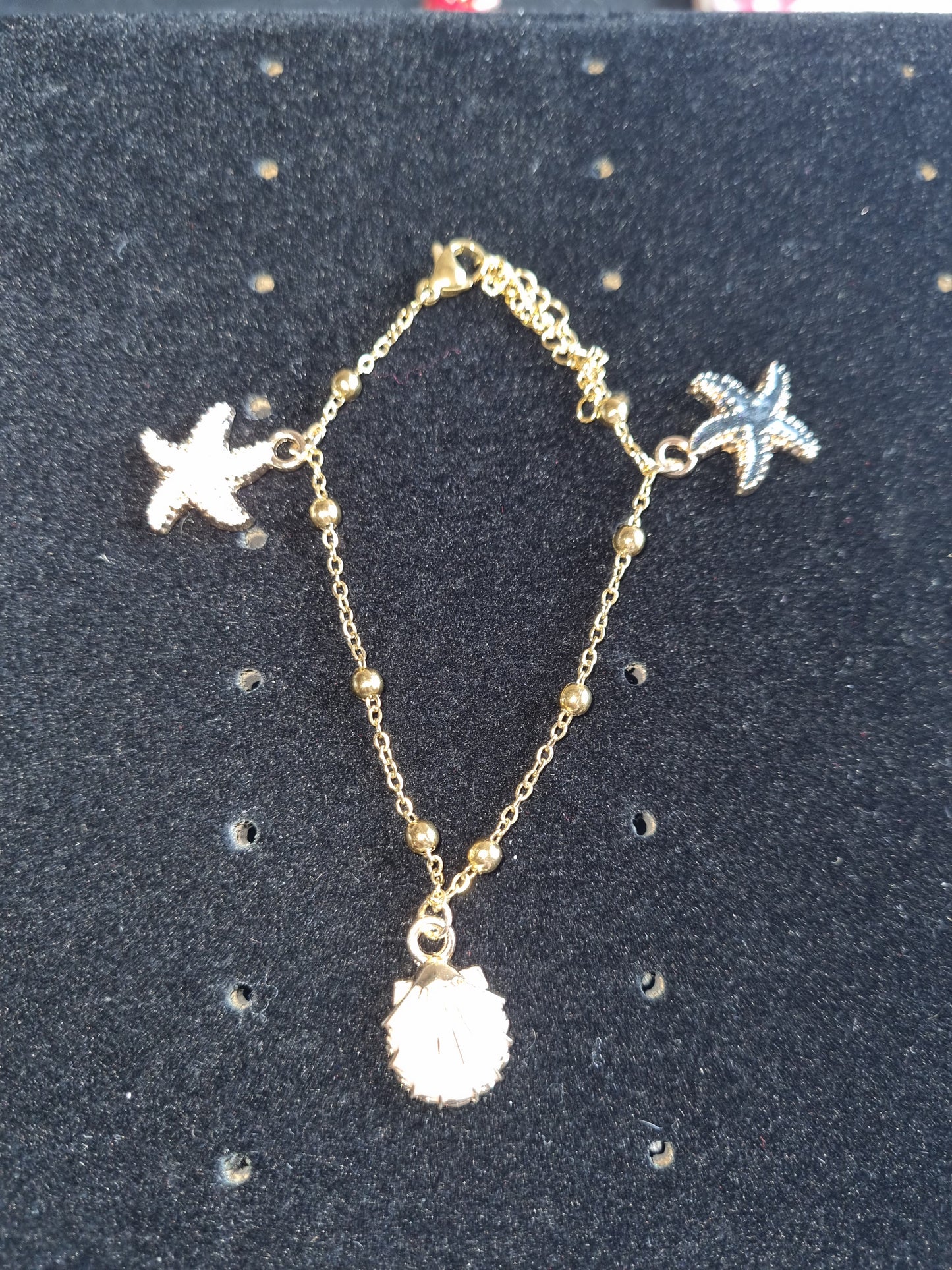 Bracelet fantaisie étoile de mer et coquillage chaine acier inoxydable