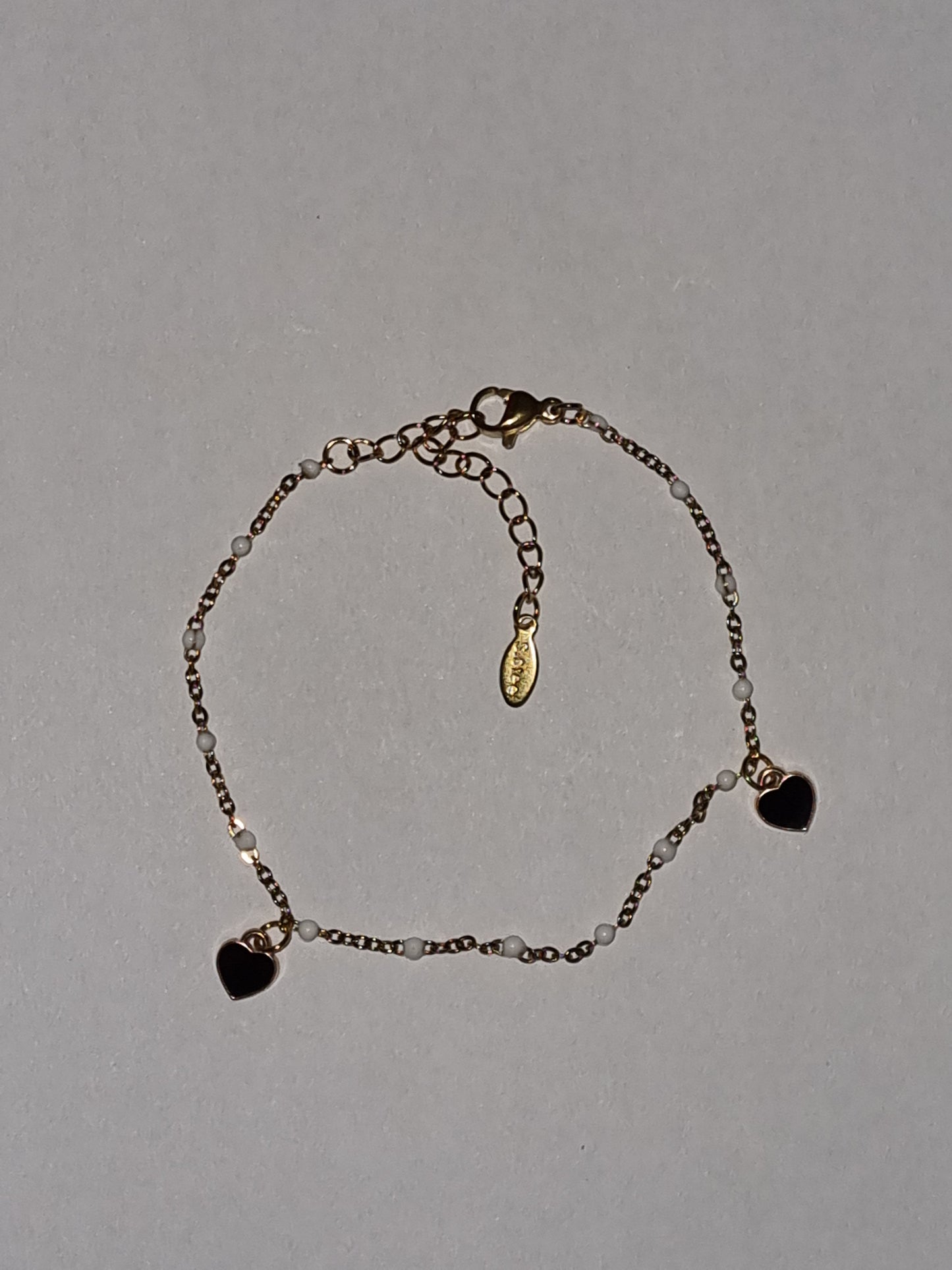 Bracelet fantaisie pampilles cœur noir