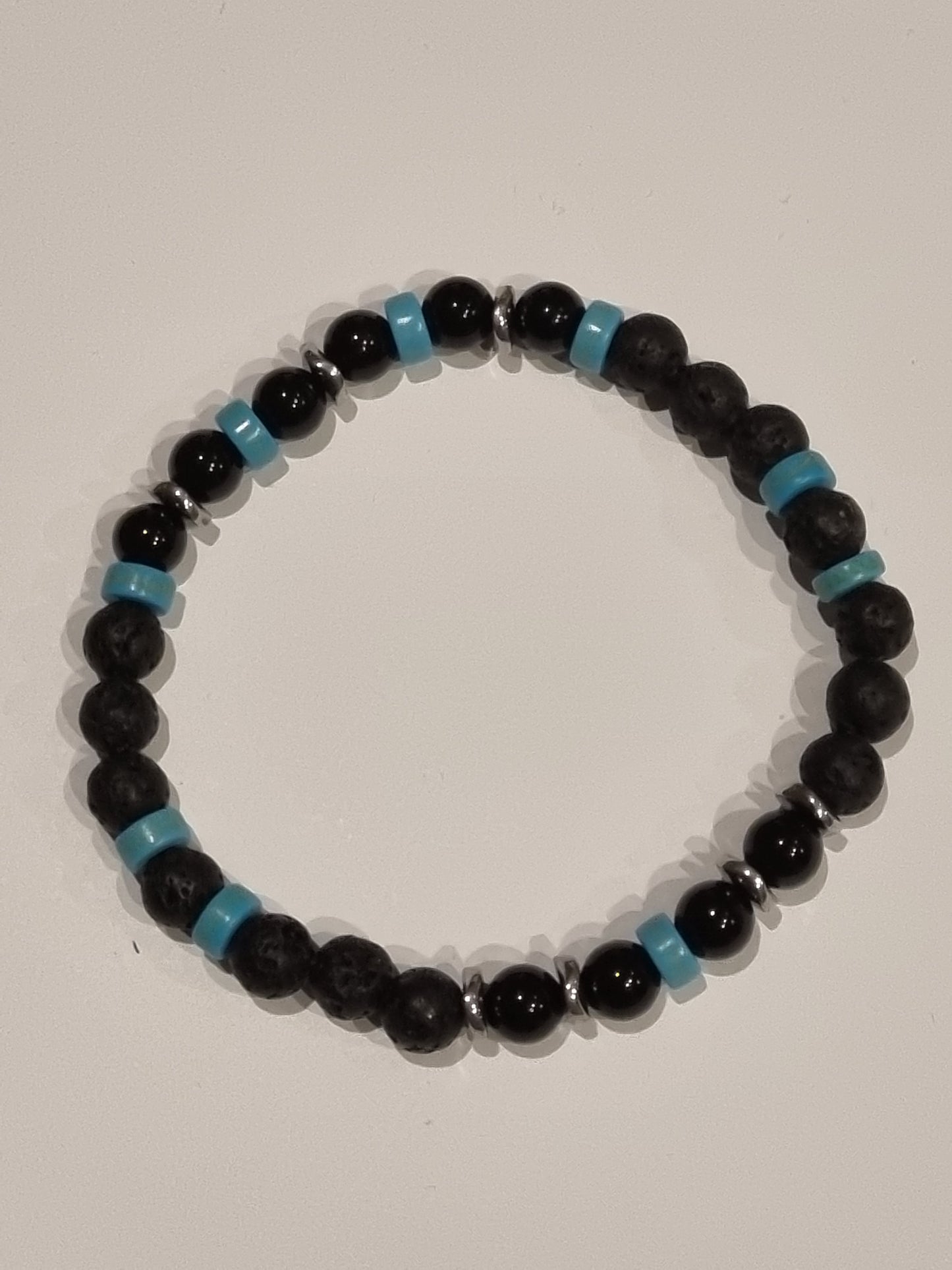 Bracelet homme perles naturelles 6mm onyx ,pierre de lave hématite,turquoise .