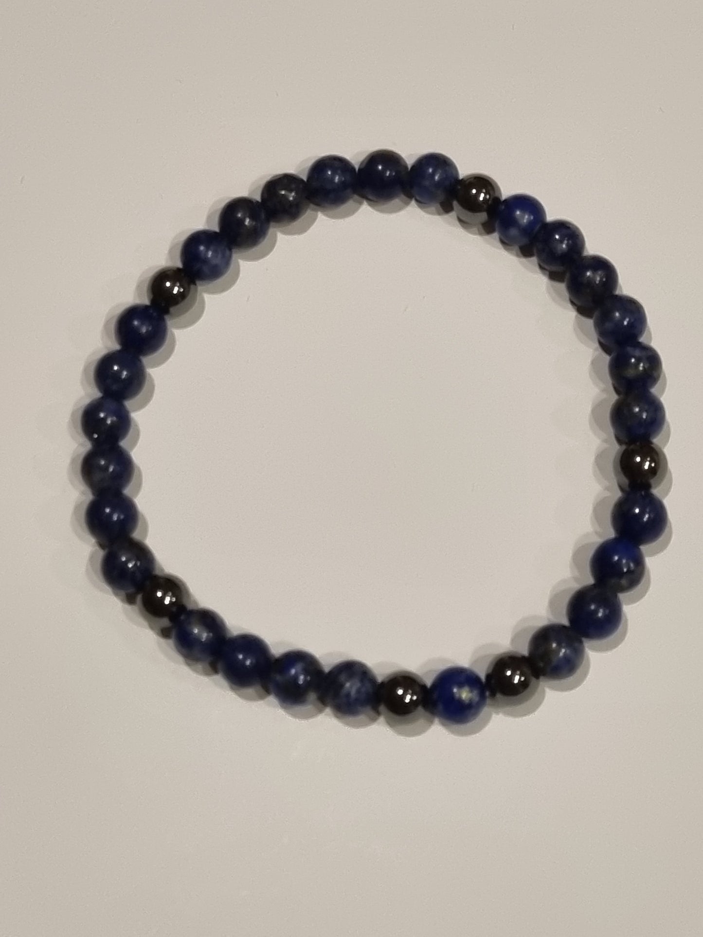 Bracelet homme 6mm perles naturelles lapi lazuli et hématite. Élastique