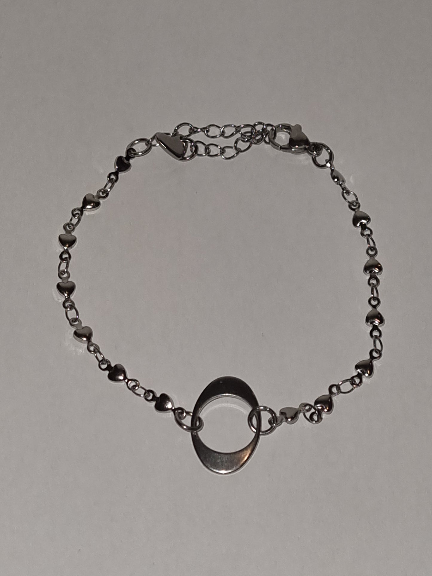 Bracelet breloque chaine acier inoxydable couleur argenté.